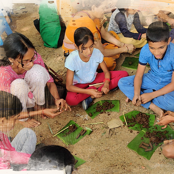 Children and volunteers in desi activities.